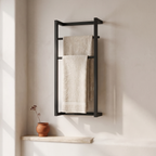 Doppio two bar cast iron towel rack — styled with linen bath towels