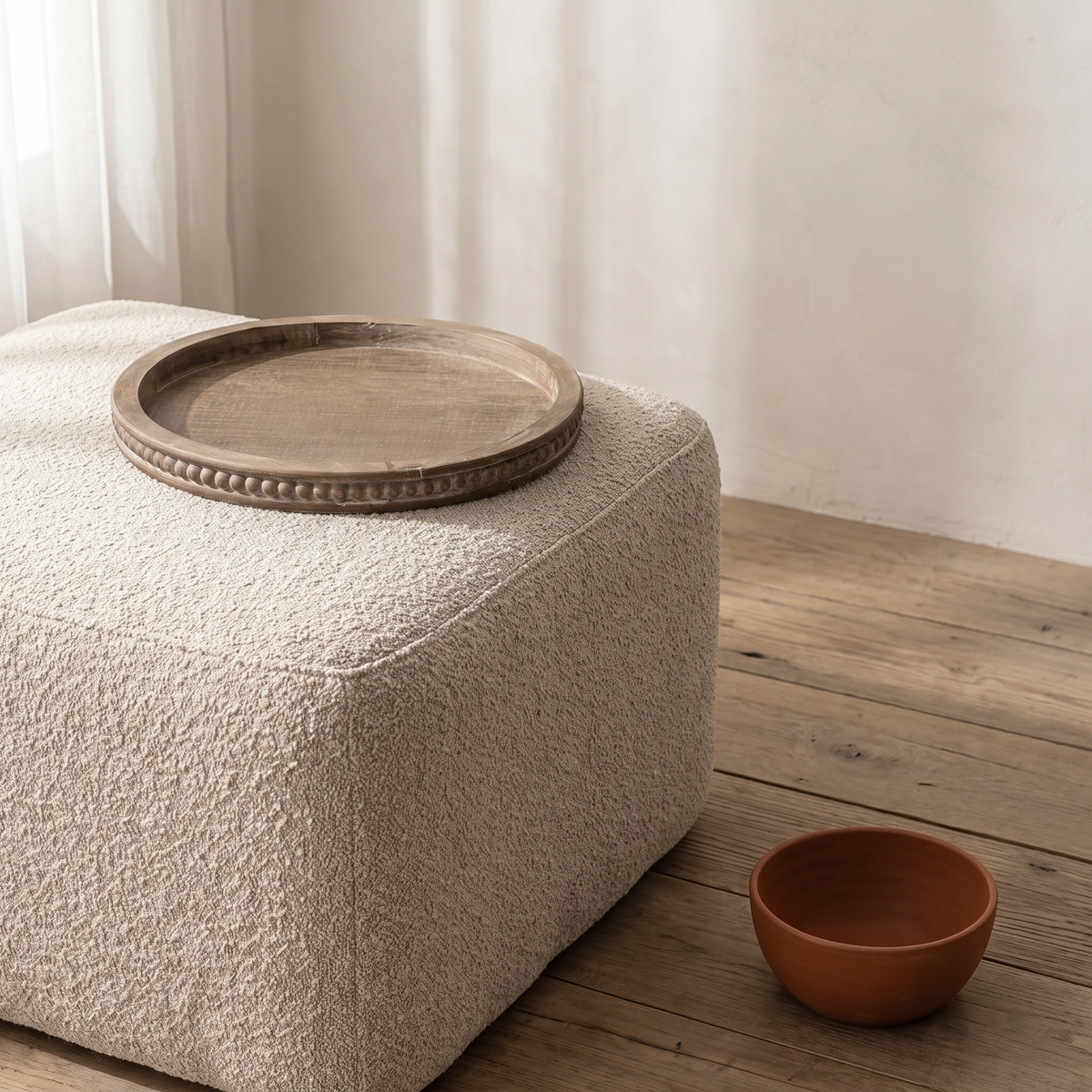 Fattoria rustic wooden serving tray — on a living room ottoman
